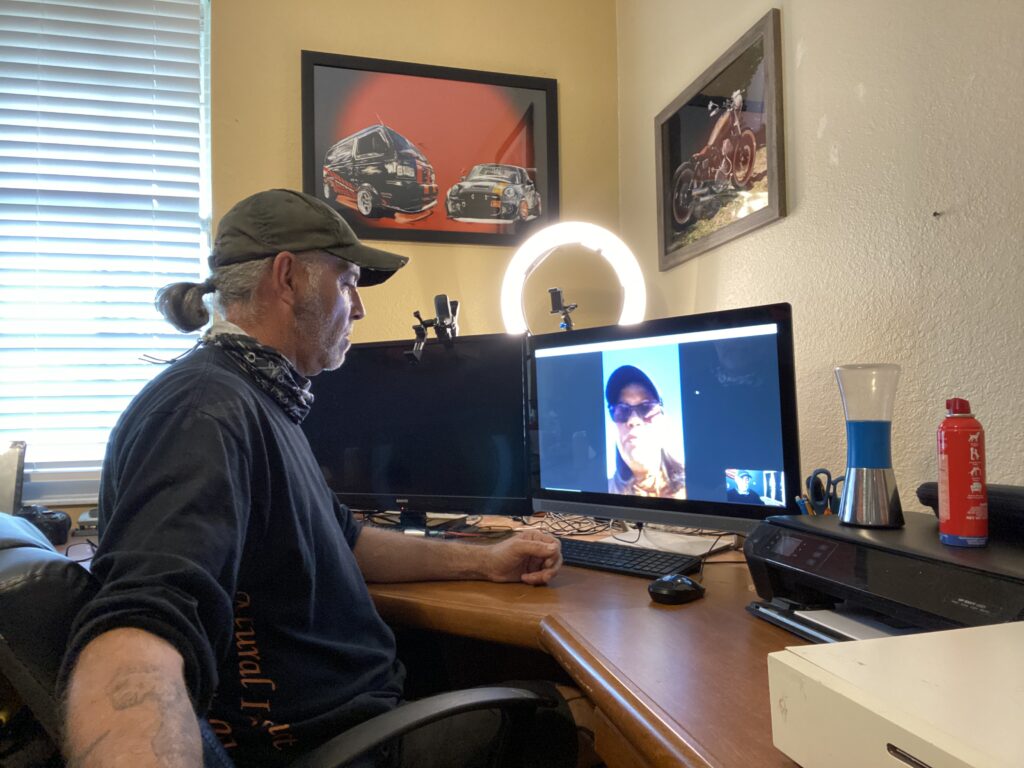 Gary Adams performing a virtual dog training session with a client