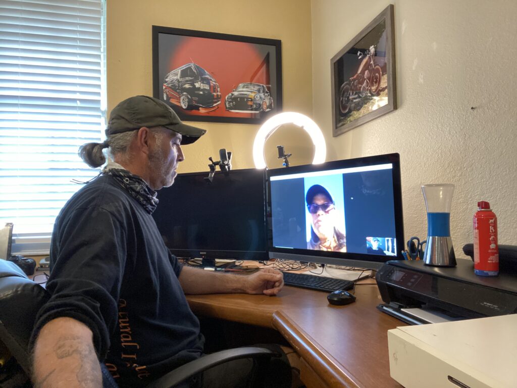 Gary Adams performing a virtual dog training session with a client